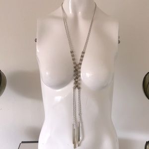 Silver and gold tone necklace looks like a tie.